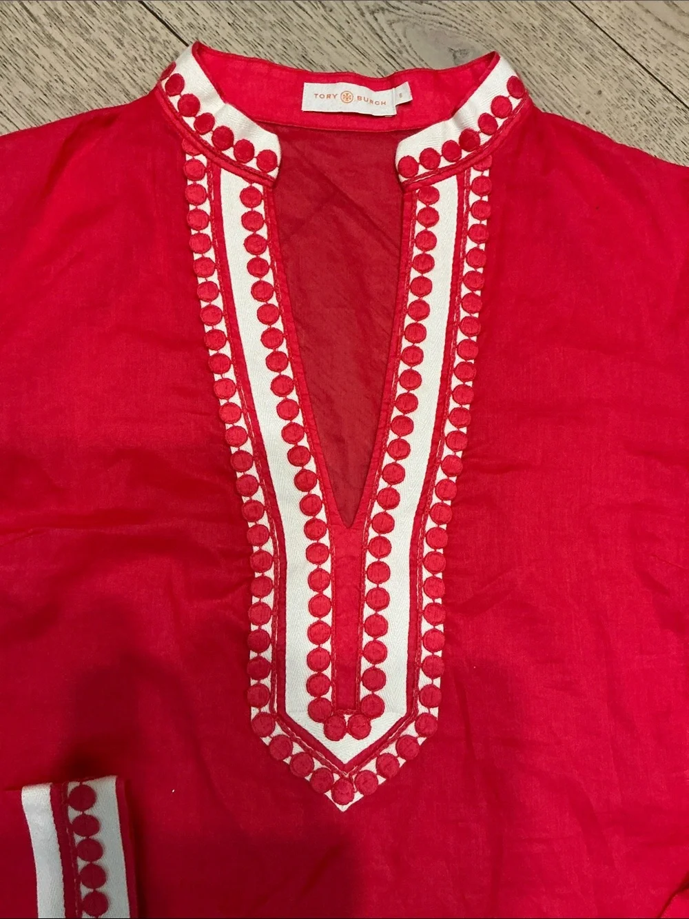 Woman’s Tory Burch red tunic top. Small. V neck. Side zipper. Barely worn! Cute!